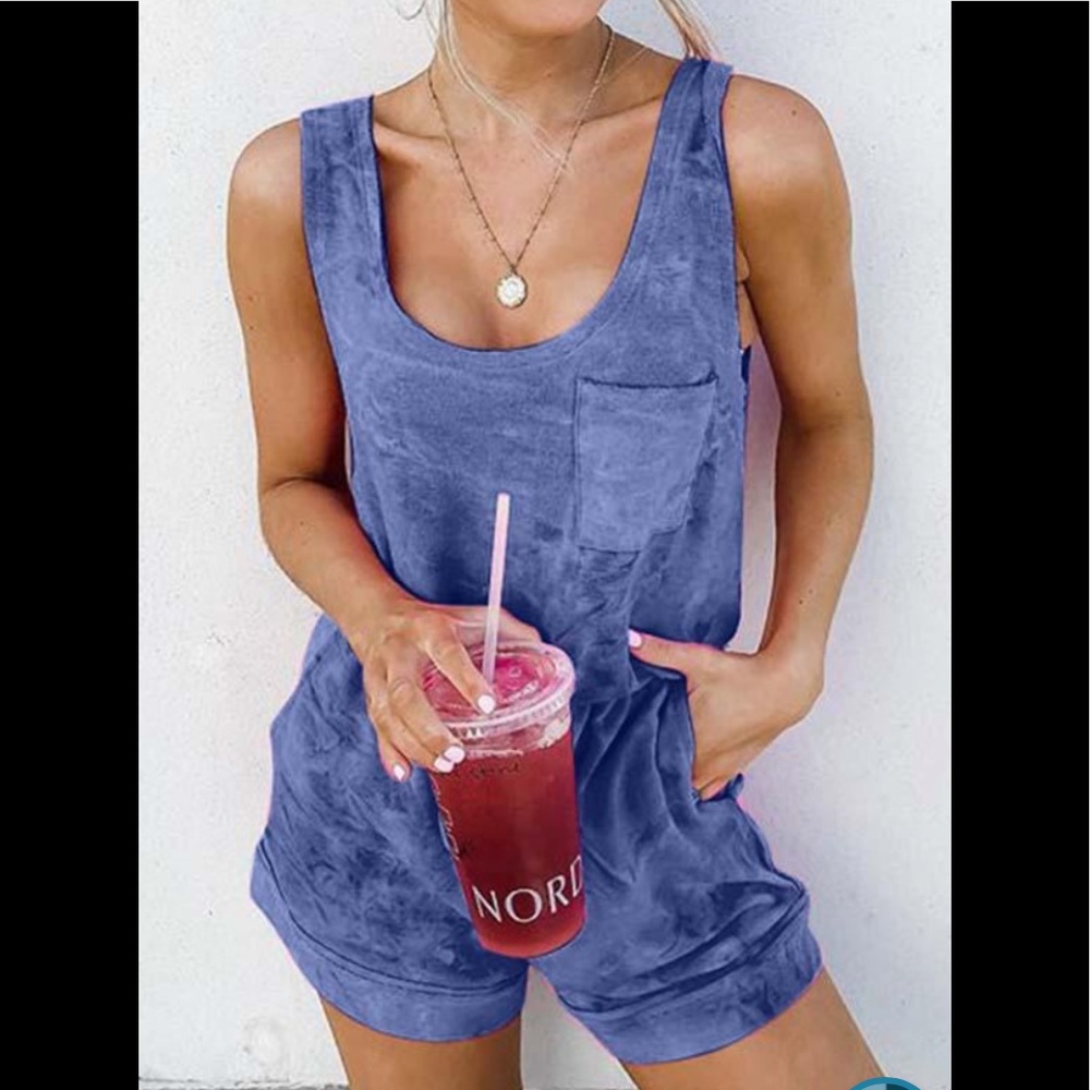 New in package, never worn, suede like blue romper